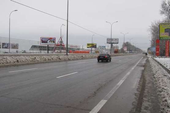 Фото рекламної площини за адресою Київ - Одеса, 01км + 400 до Києва біля супермаркета "Нова лінія" (зліва в  напр. м.Одессы)