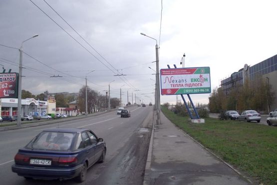 Фото рекламной плоскости по адресу вул. М.Бірюзова (КФ «Домінік»)