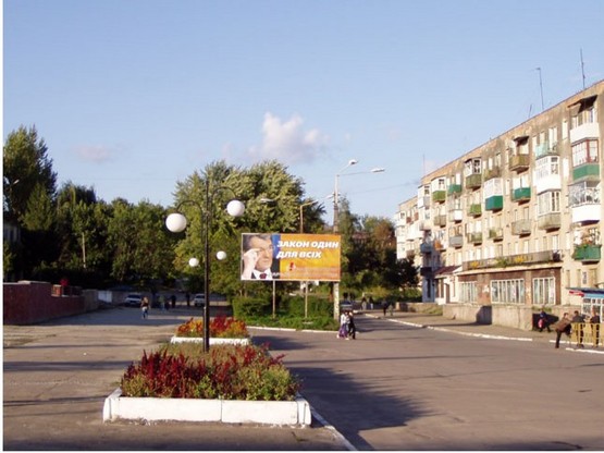 Фото рекламной плоскости по адресу вул. Грушевського,6-8(кіоск Сніжок)