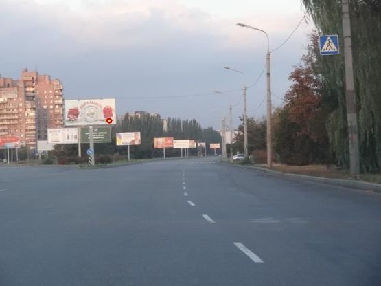 Фото рекламной плоскости по адресу Заводская Набережная ул., 53, Ледовая арена, возле Новокодакского парка, из центра