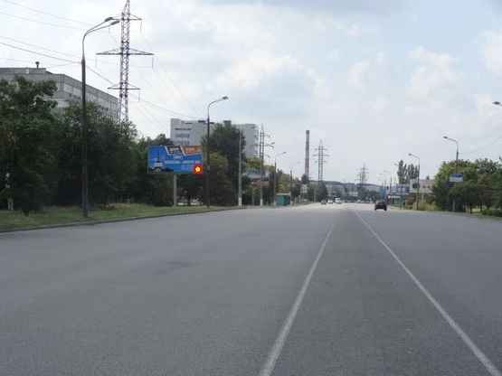 Фото рекламної площини за адресою Заводская Набережная ул., мебельный комбинат "Прогресс", из центра