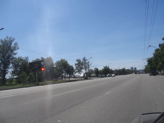 Фото рекламной плоскости по адресу ул.Набережная Победы, напротив д.44/1, из центра