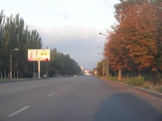 Фото рекламной плоскости по адресу Заводская Набережная ул., 4 - Красный Камень ул., из центра