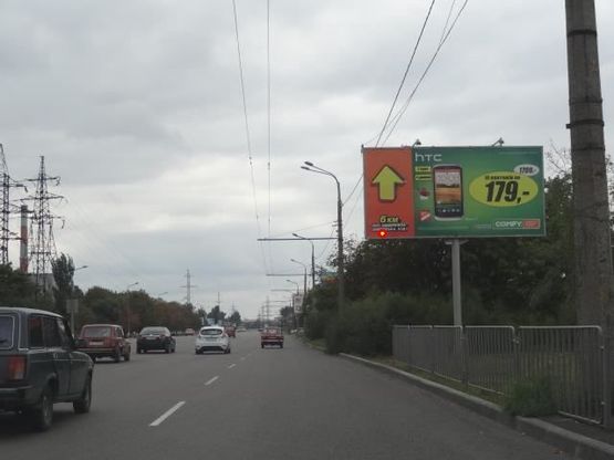 Фото рекламной плоскости по адресу Заводская Набережная ул. - Павлова ул., из центра