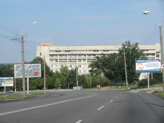 Фото рекламной плоскости по адресу Космическая ул., обласная больница, областной онкоцентр, в центр
