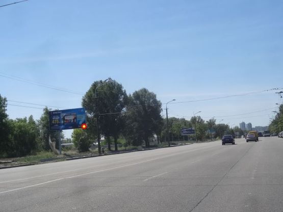 Фото рекламной плоскости по адресу Набережная Победы ул., 32, из центра