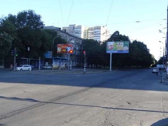 Фото рекламной плоскости по адресу Рабочая ул. - Уральская ул., из центра