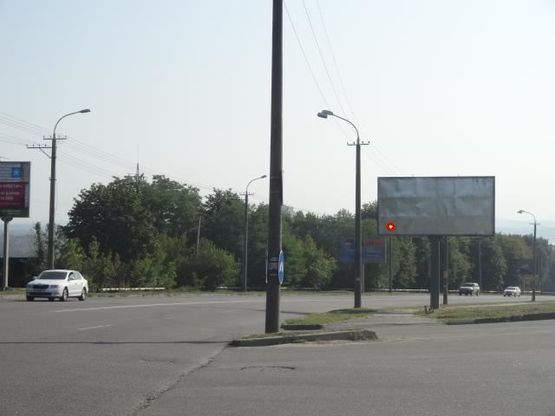 Фото рекламной плоскости по адресу Космическая ул. - Комарова ул., в центр