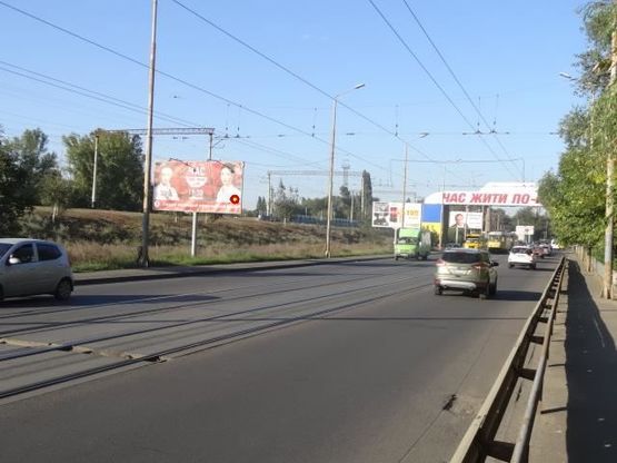 Фото рекламной плоскости по адресу Амурский мост - Мануйловский пр., съезд с моста
