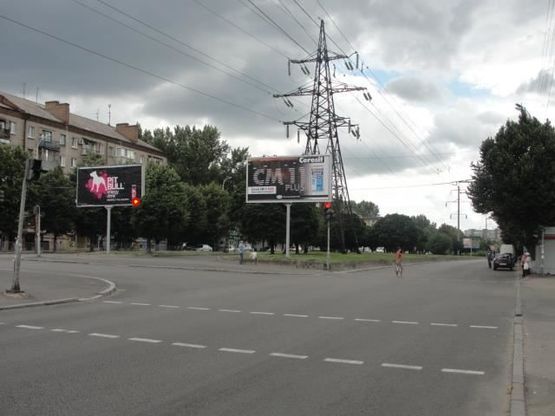 Фото рекламной плоскости по адресу Поля пр. - Стромцова ул., из центра