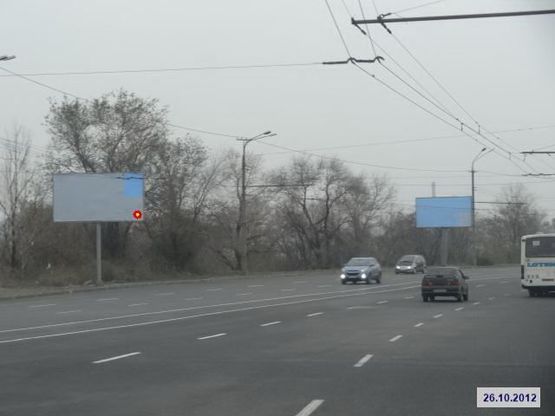 Фото рекламной плоскости по адресу Заводская Набережная ул., возле Шлакоотвала, в центр