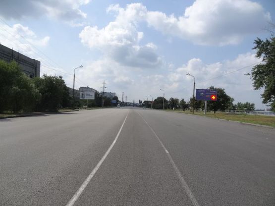 Фото рекламной плоскости по адресу Заводская Набережная ул., яхтклуб "Прибой", из центра