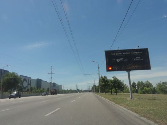 Фото рекламної площини за адресою Заводская Набережная ул., возле завода "ЕВРАЗ", из центра