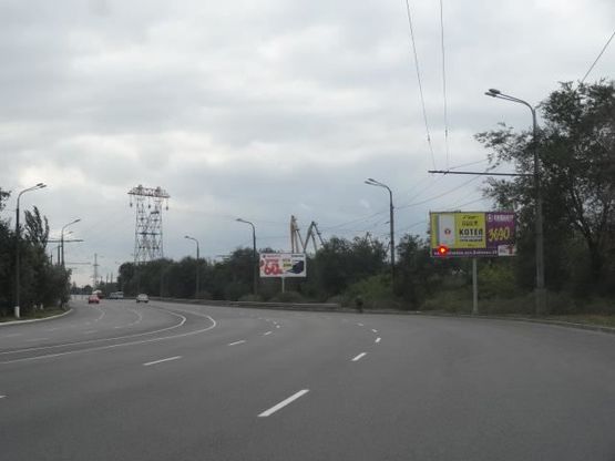 Фото рекламной плоскости по адресу Заводская Набережная ул., возле Шлакоотвала, из центра