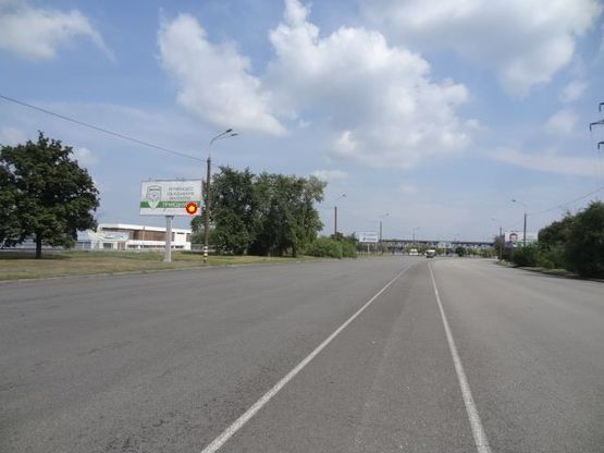 Фото рекламной плоскости по адресу Заводская Набережная ул., яхтклуб "Прибой", в центр