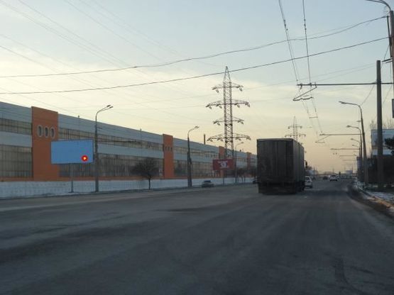 Фото рекламної площини за адресою Заводская Набережная ул., возле завода им. Петровского, из центра