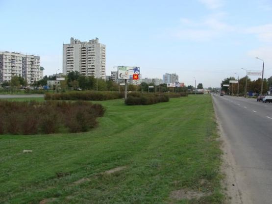 Фото рекламной плоскости по адресу Набережна магістраль - вул.Українська (коло) , напрямок руху до вокзалу