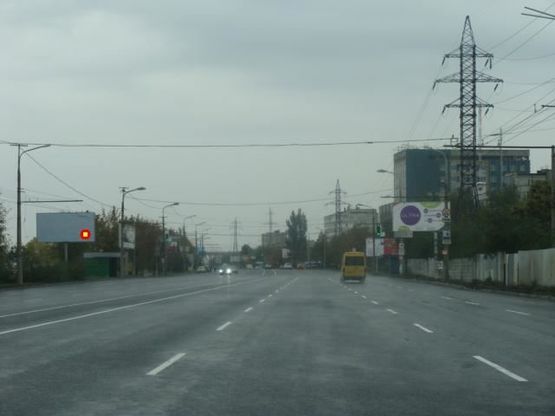 Фото рекламной плоскости по адресу Заводская Набережная ул. - Павлова ул., в центр