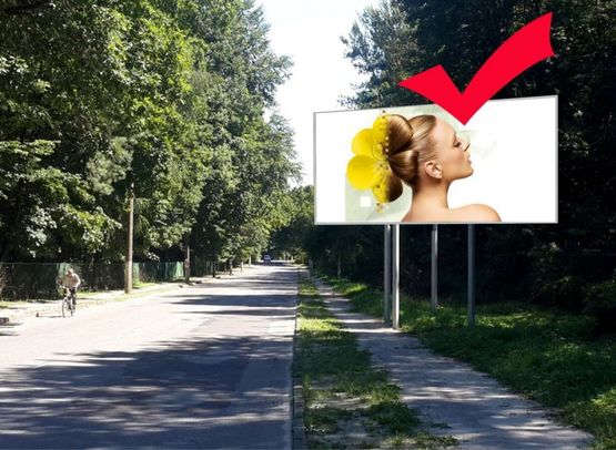 Фото рекламной плоскости по адресу Львів-Брюховичі, вул.Курортна, біля церкви, до Львова