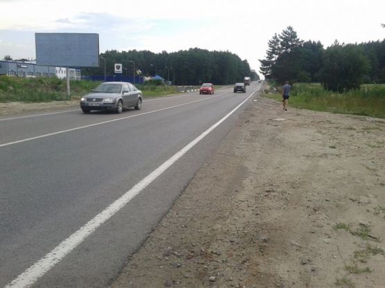 Фото рекламної площини за адресою М-10, Західний обхід м.Львова, км 0+400, Фуджікура Аутомотів, Сканія Львів, ліворуч