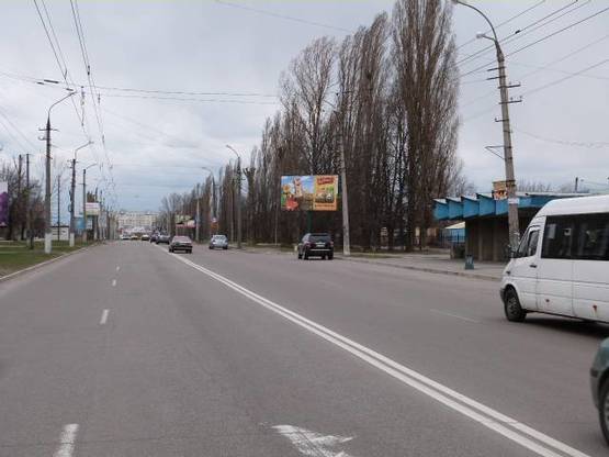 Фото рекламної площини за адресою просп. Л.Украинки (просп. 50-лет. Октября), возле гипермаркета «Велмарт», перекрёсток с ул.Новороссийской