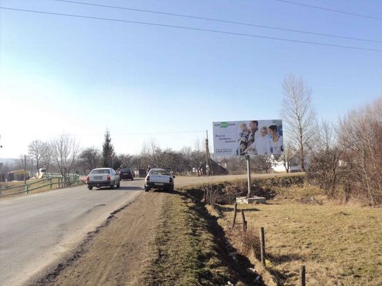 Фото рекламной плоскости по адресу Траса Чернівці-Коломия-Яремче, с.Ланчин біля ринку Торговиця напрямок руху на Яремче