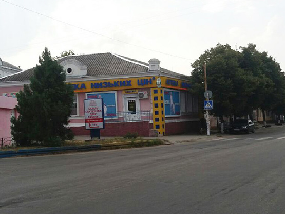 Фото рекламной плоскости по адресу ул.195 Стрелковой дивизии (поворот на рыночную площадь)