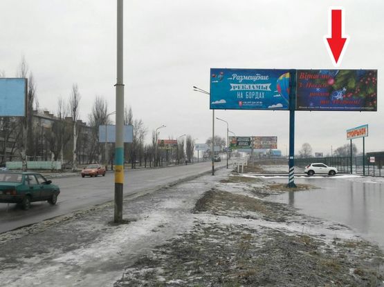 Фото рекламной плоскости по адресу ул. Днепровская, 129( Центр, поворот на ул.Богуна Ивана)