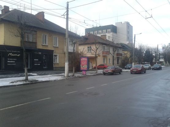 Фото рекламної площини за адресою Покровская ул.,25 (м-н «Моне»,віділення новой пошти №3,маркет «Квартал»)