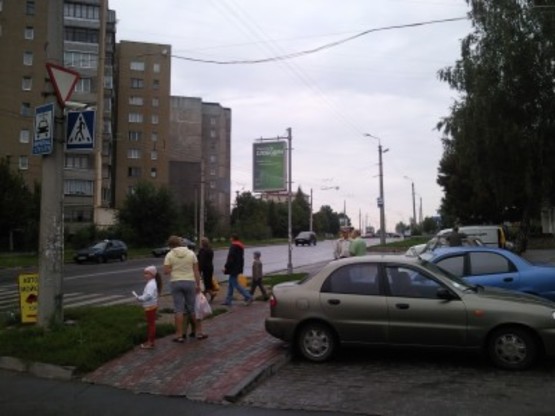 Фото рекламной плоскости по адресу вул.П.Мирного(Супермаркет "Дана")