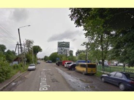 Фото рекламної площини за адресою вул.Шухевича(біля Торговиці) нижній