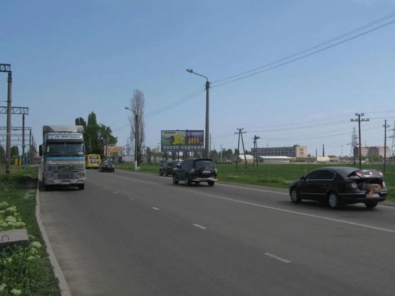Фото рекламной плоскости по адресу ул.Промыщленная, ул.Промышленая, въезд в город
