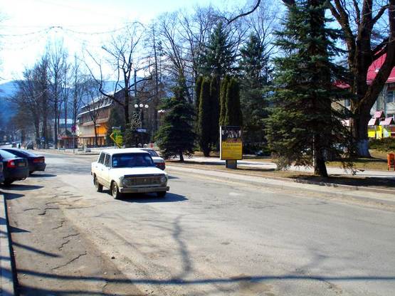 Фото рекламной плоскости по адресу Траса Н-09 Мукачево-Львів, Свободи, супермаркет Вопак, напрямок руху на Буковель