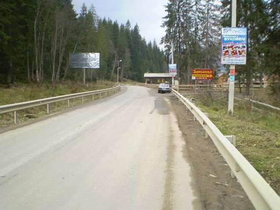 Фото рекламної площини за адресою Траса Н-09 Мукачево-Львів, дорога на Буковель (с.Поляниця), біля садиби "Ра", 300 м до Буковеля, напрямок руху на Буковель