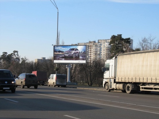 Фото рекламной плоскости по адресу Броварской просп. (ст. м.  Лесная, парк Киото, Автостанция Дарица) по направлению в город