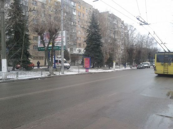 Фото рекламной плоскости по адресу Победы ул., 54 (ТЦ «Дастор», віділення «Ощадбанк», райвиконком)