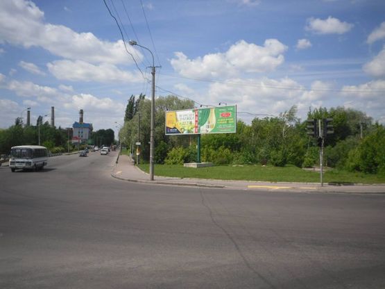 Фото рекламної площини за адресою м. Рівне, вул. Р.Шухевича, в районі перехрестя з вул. Кн. Володимира