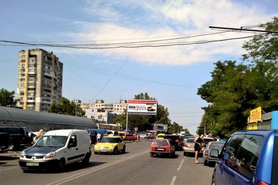 Фото рекламної площини за адресою ул. Бочарова / ул. Добровольского (рынок "Северный")