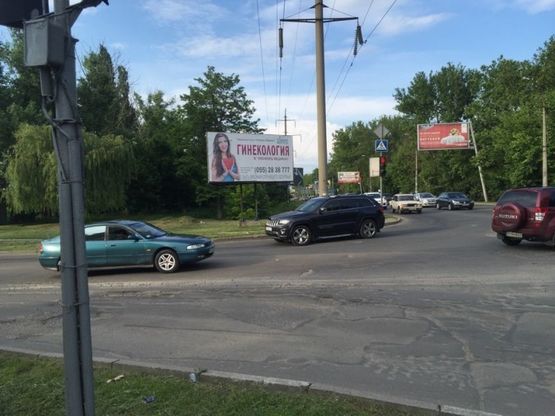 Фото рекламной плоскости по адресу Ж.переезд с Бериславского ш.на ул.Паровозная