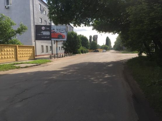 Фото рекламной плоскости по адресу Угол ул.Паровозная и ул.49Гв.Дивизии