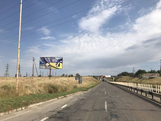 Фото рекламной плоскости по адресу Николаевское шоссе(выезд из Херсона)