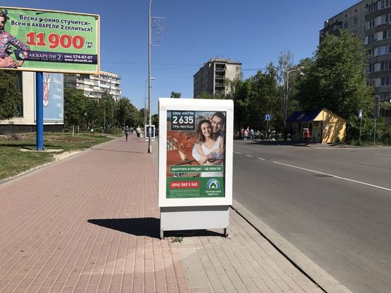 Фото рекламной плоскости по адресу ул.Святошинская, возле мерии, напротив Новуса