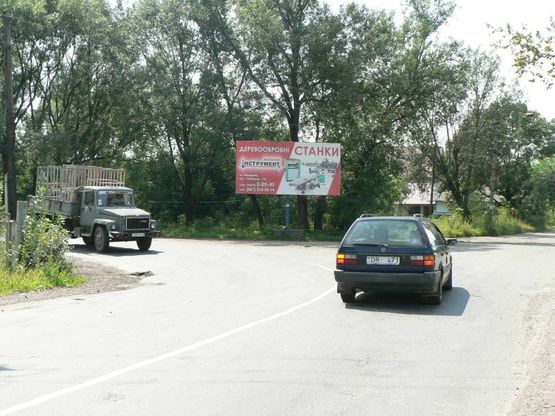 Фото рекламної площини за адресою Траса Н-09 Мукачево-Львів,Січинського-Вокзальна (об'їзна дорога), Прикарпатський Торговий Дім, напрямок руху на Яремче, Буковель