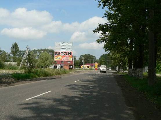 Фото рекламної площини за адресою Траса Н-09 Мукачево-Львів, вул.Січинського, шиномонтаж, Лісбуд, будевільний серепмаркет, напрямок руху на Івано-Франківськ