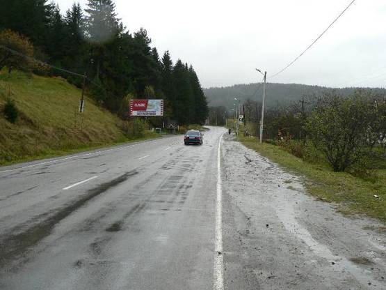 Фото рекламної площини за адресою Траса Н-09 Мукачево-Львів, виїзд з міста в сторону Буковеля, джерело, автозупинка, напрямок руху на Буковель