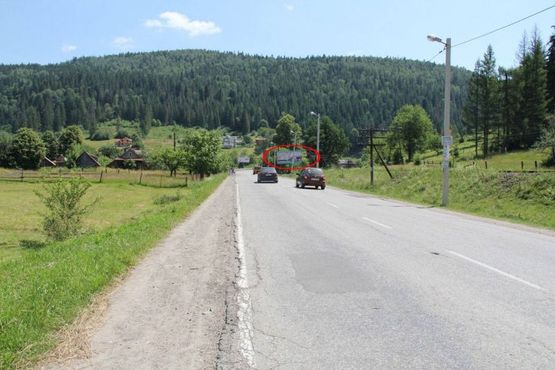 Фото рекламной плоскости по адресу Траса Н-09 Мукачево-Львів, 250 м після готелю Гердан, в`їзд у селище, напрямок руху на Буковель