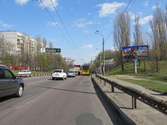 Фото рекламної площини за адресою Телиги Е. ул. (300м от АЗС "Shell", Детская больница, Кириловская Церковь, в направ. Петровки