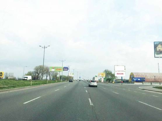 Фото рекламной плоскости по адресу Софиевская Борщаговка, Кольцевая дорога,на пересечении с ул.Яна Качуры перед выездом на Жулянский мост