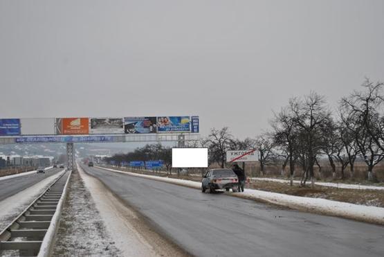 Фото рекламной плоскости по адресу Автодорога "Київ-Чоп", 200 м від кругу (перед с. Дравці)