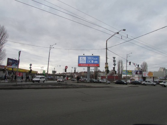 Фото рекламної площини за адресою Братиславская ул. / Ватутина проспект (по ходу с ул. Братиславская к Троещинскому рынку)